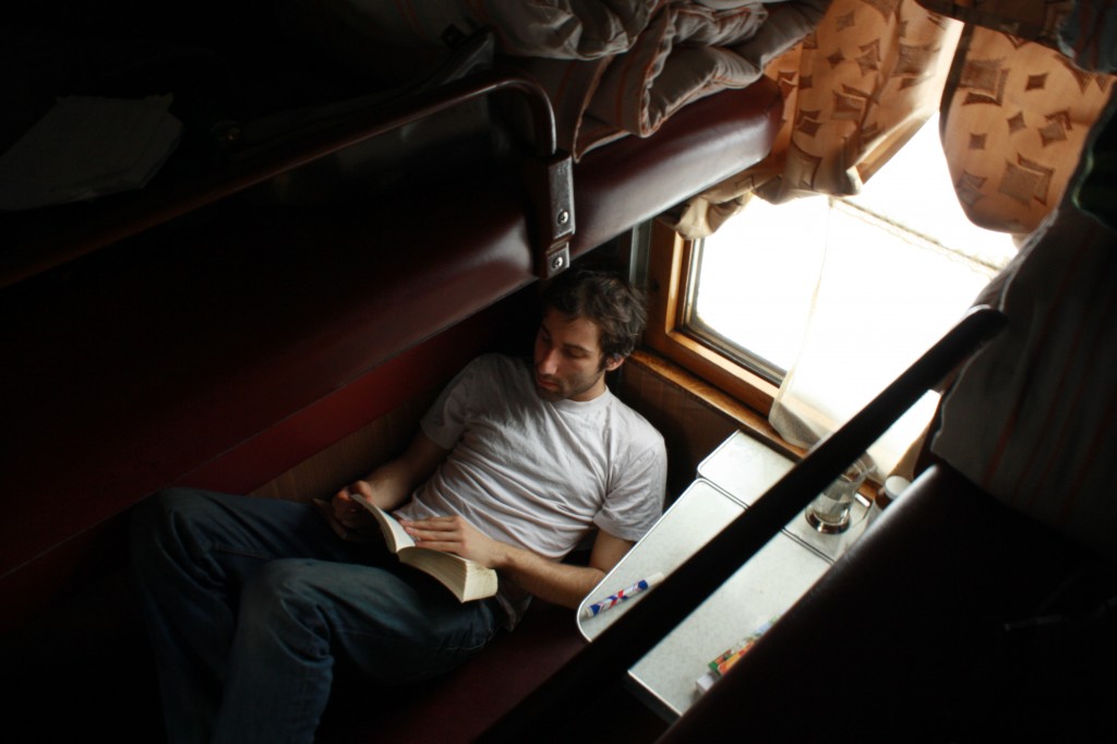 dan reading on a train
